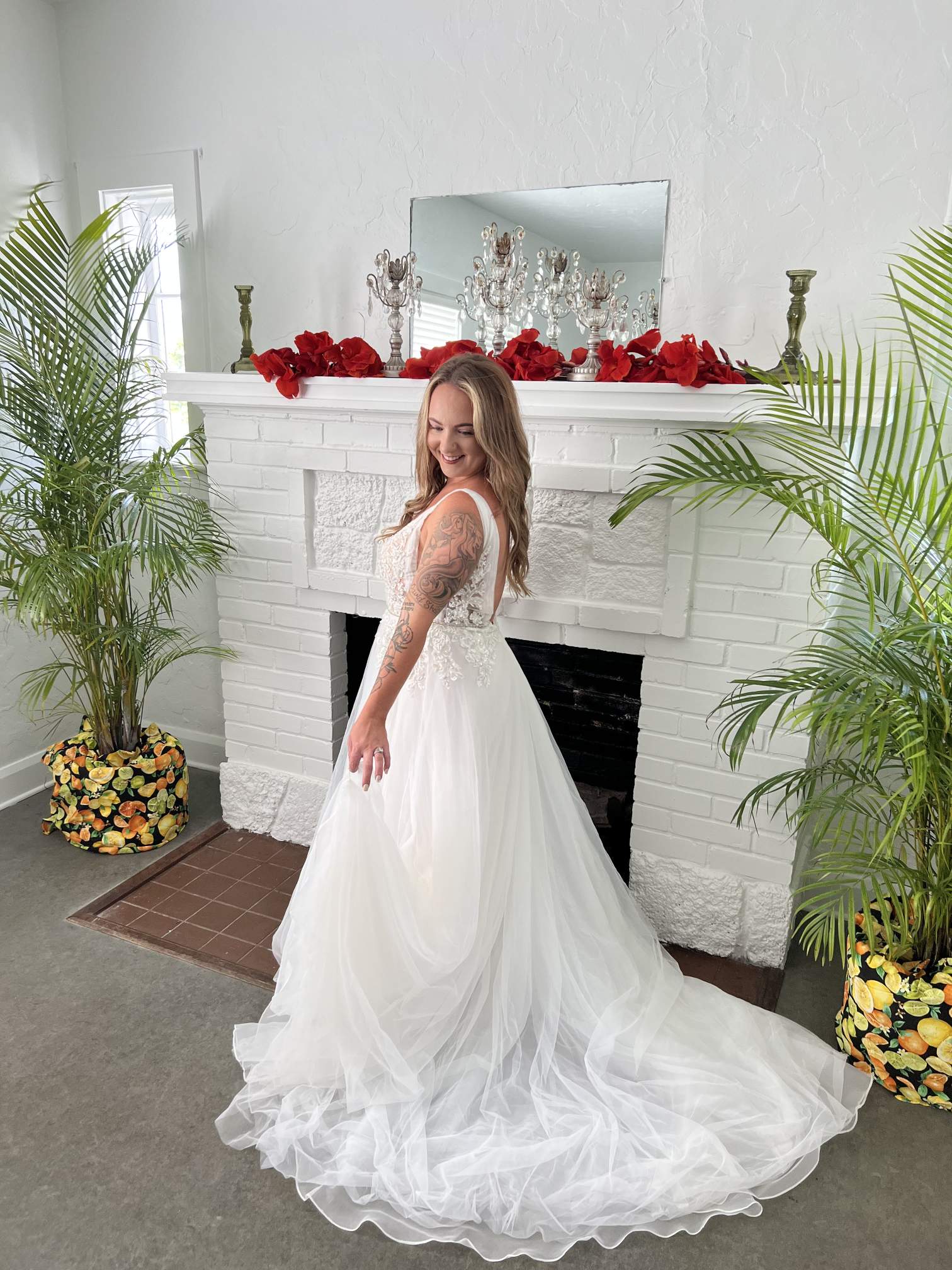 Gentleman's Lounge Fireplace with a bride in front